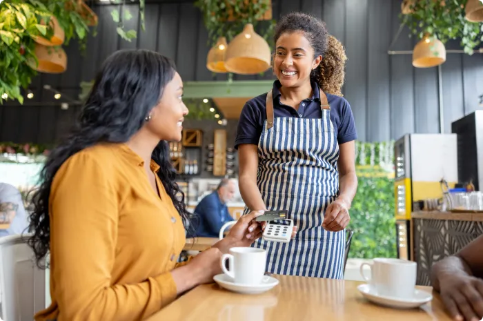 woman smiles as she considers opening a Safe Debit Account