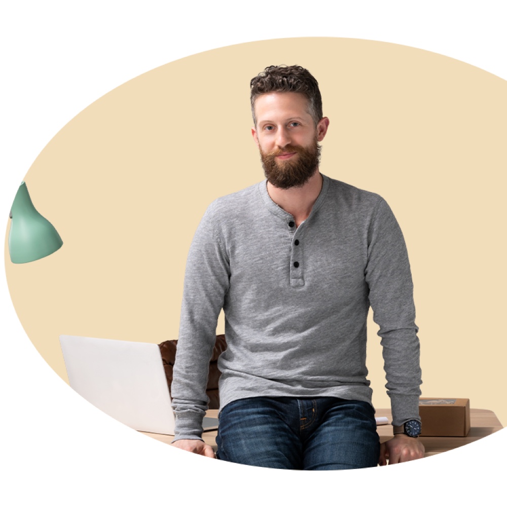 man smiling after reviewing U.S. Bank Certificate of Deposit benefits