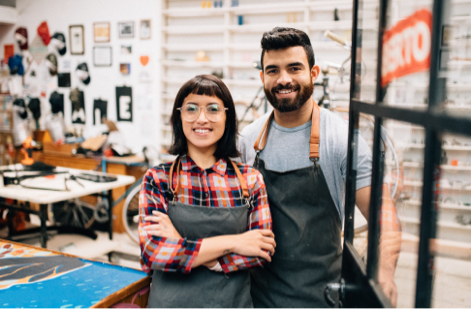 Two workers in bicycle shop 