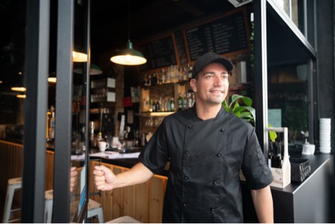 employee holding door open